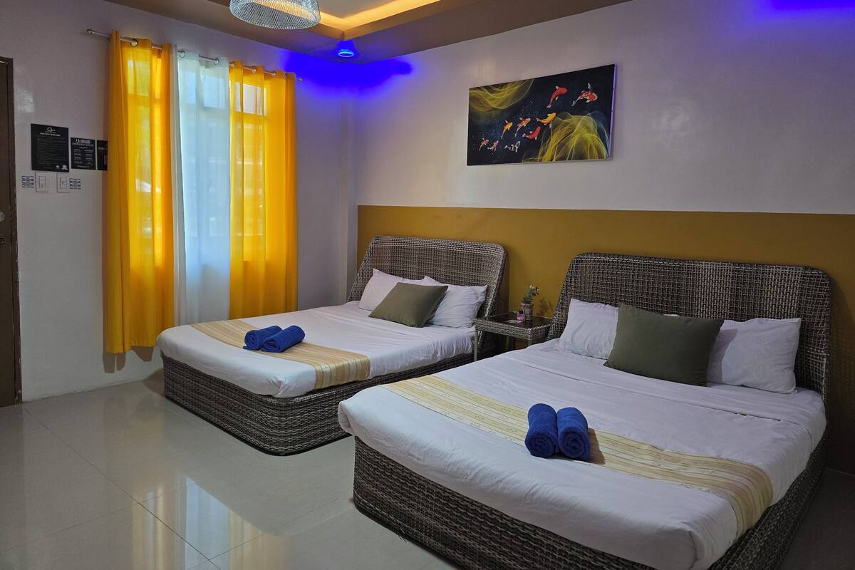 Deluxe Quadruple Room, Balcony, Pool View | Iron/ironing board, free WiFi
