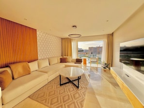 Living area - Le Romarin with pool view and beach access at Taghazout Bay (Tamraght)