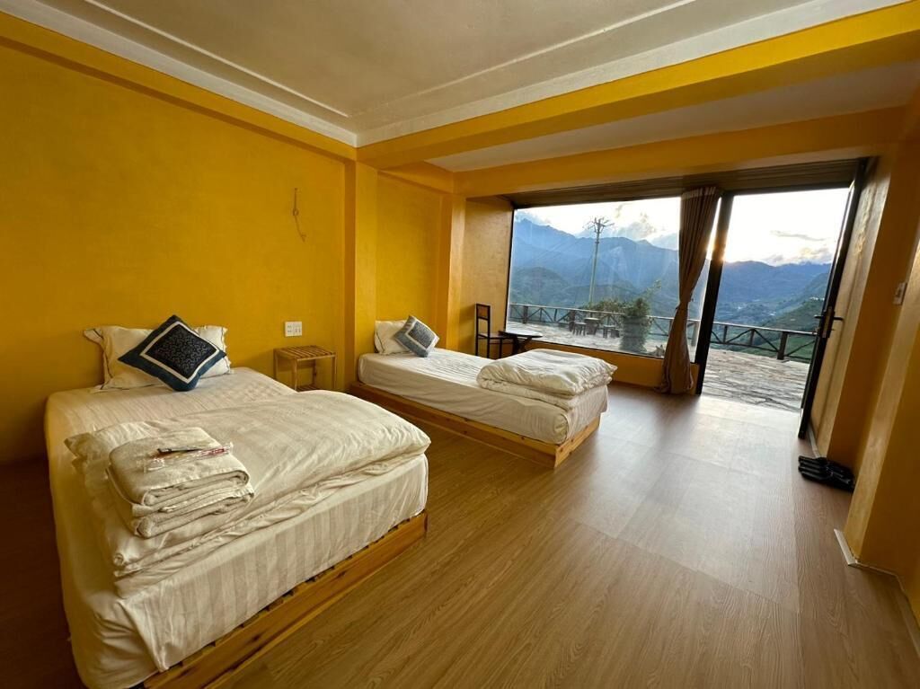 Kamar Double atau Twin Ekonomi, balkon, pemandangan gunung | Meja kerja, kedap suara, setrika/meja setrika, dan Wi-Fi gratis