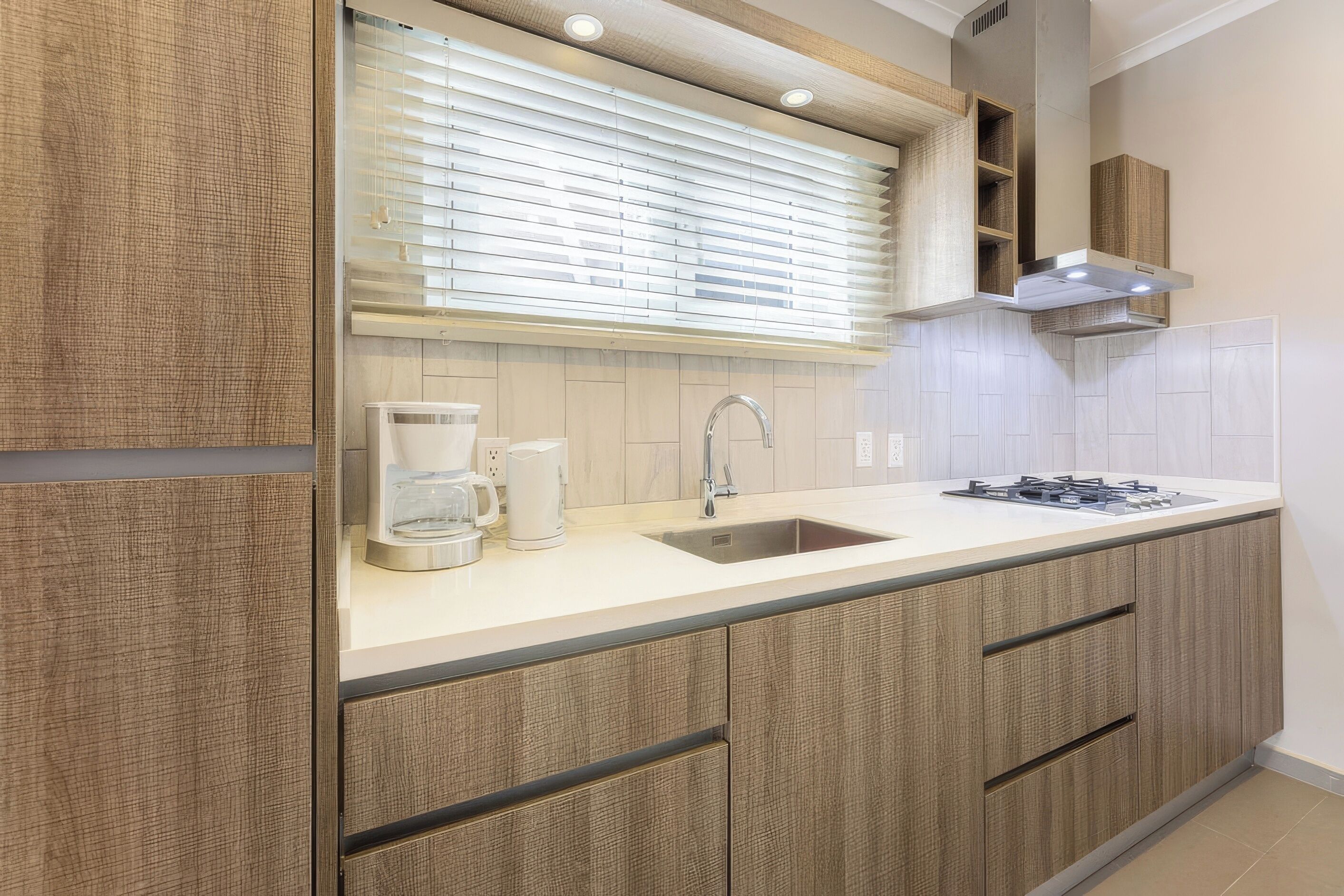 Fridge, microwave, stovetop, coffee/tea maker