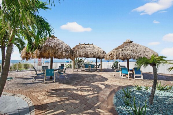 Outdoor dining - Beachside Condo • Across to Johns Pass Village (Madeira Beach)