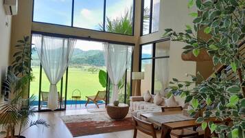 Comfort Villa | Living area | 24-inch flat-screen TV with digital channels