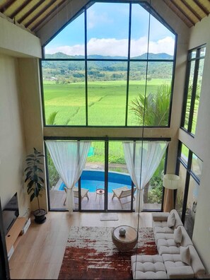 Comfort Villa | Living area | 24-inch flat-screen TV with digital channels - Kembang Menoreh Villa (Kalirejo)