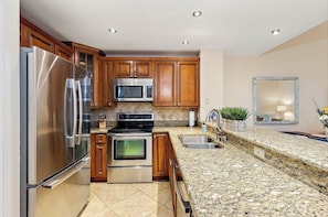 Private kitchen - Walk to the beach at this highly sought after 2 bedroom condo! (St. Augustine)