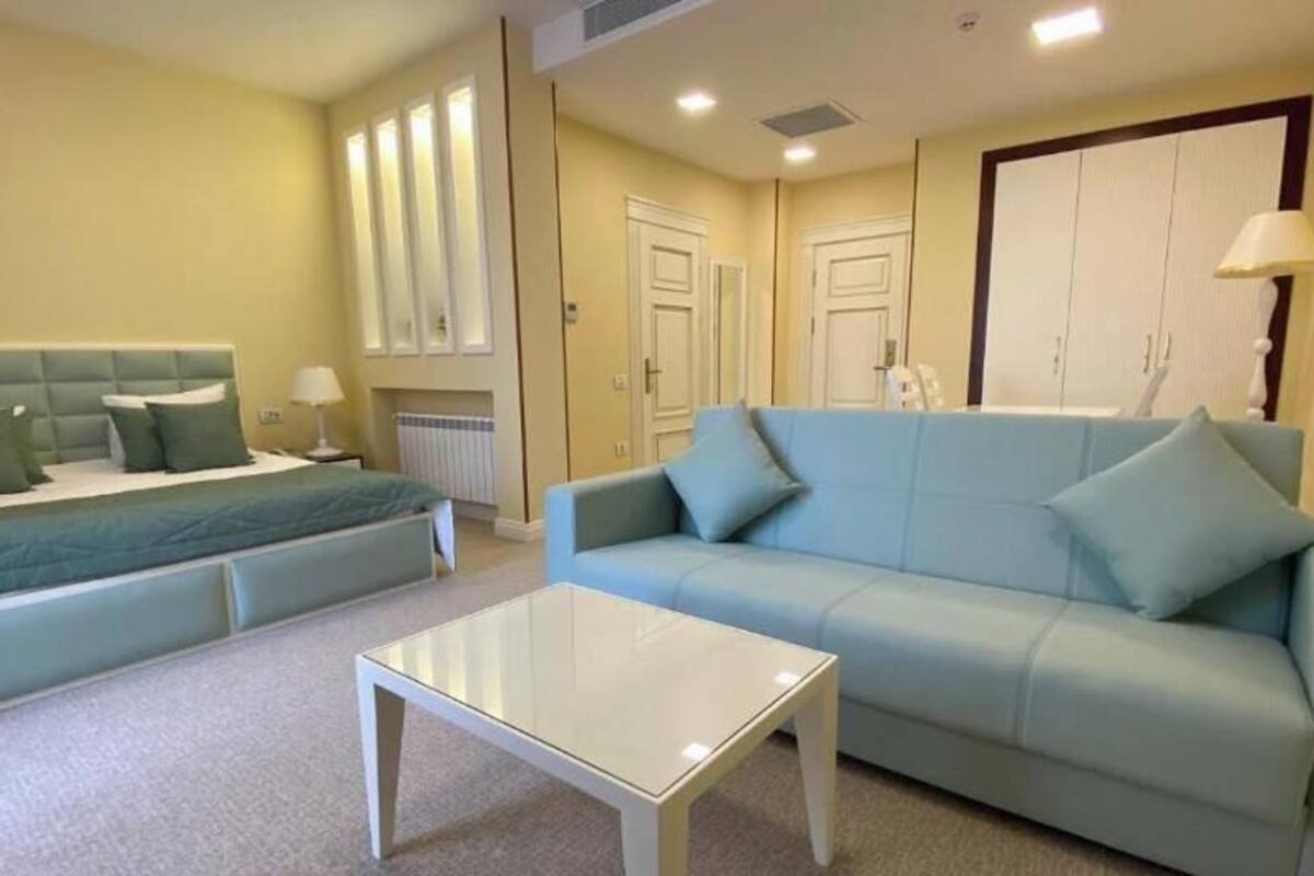 Junior Suite, Mountain View | Minibar, in-room safe, desk, laptop workspace