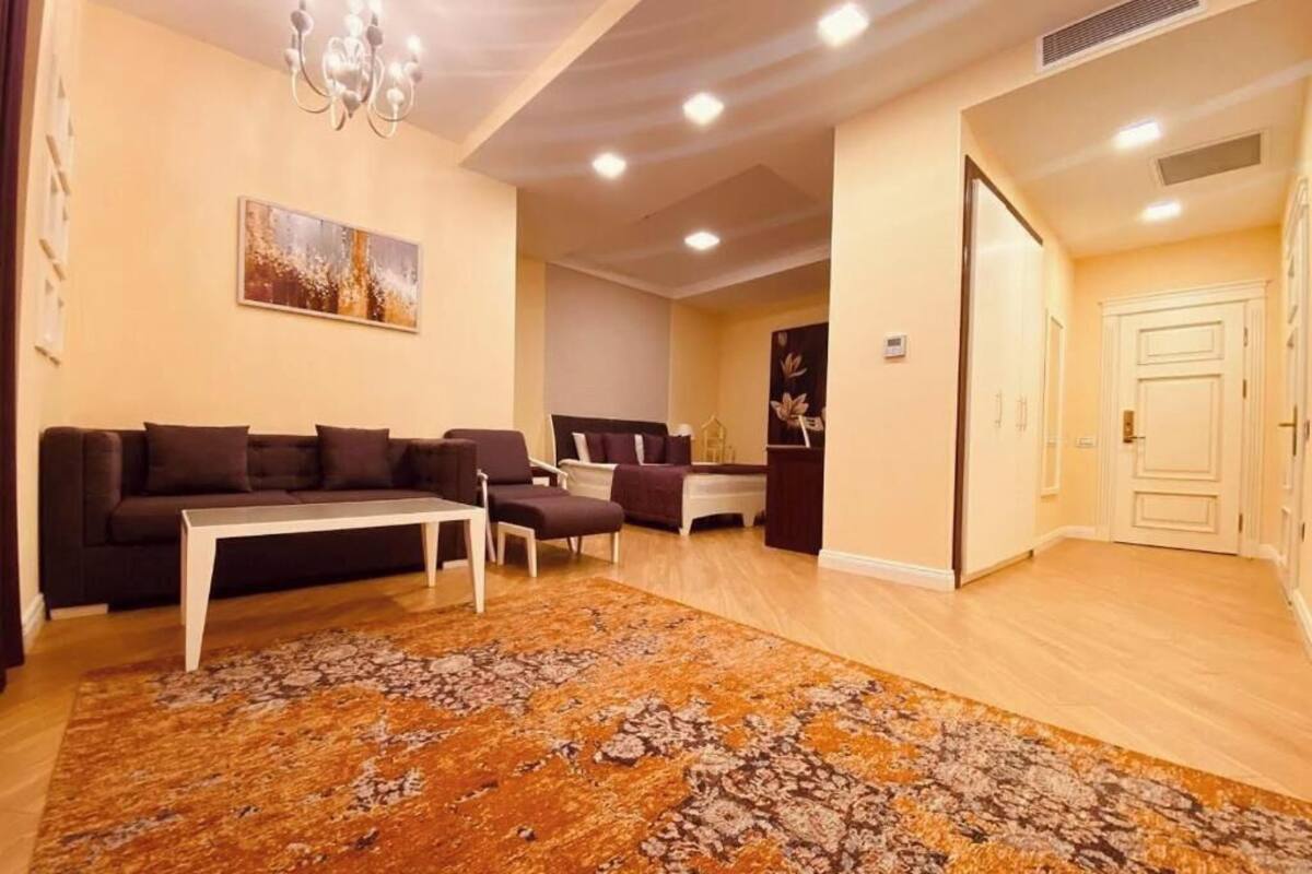 Family Room, Balcony, City View | Minibar, in-room safe, desk, laptop workspace