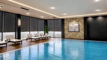 Indoor pool, sun loungers
