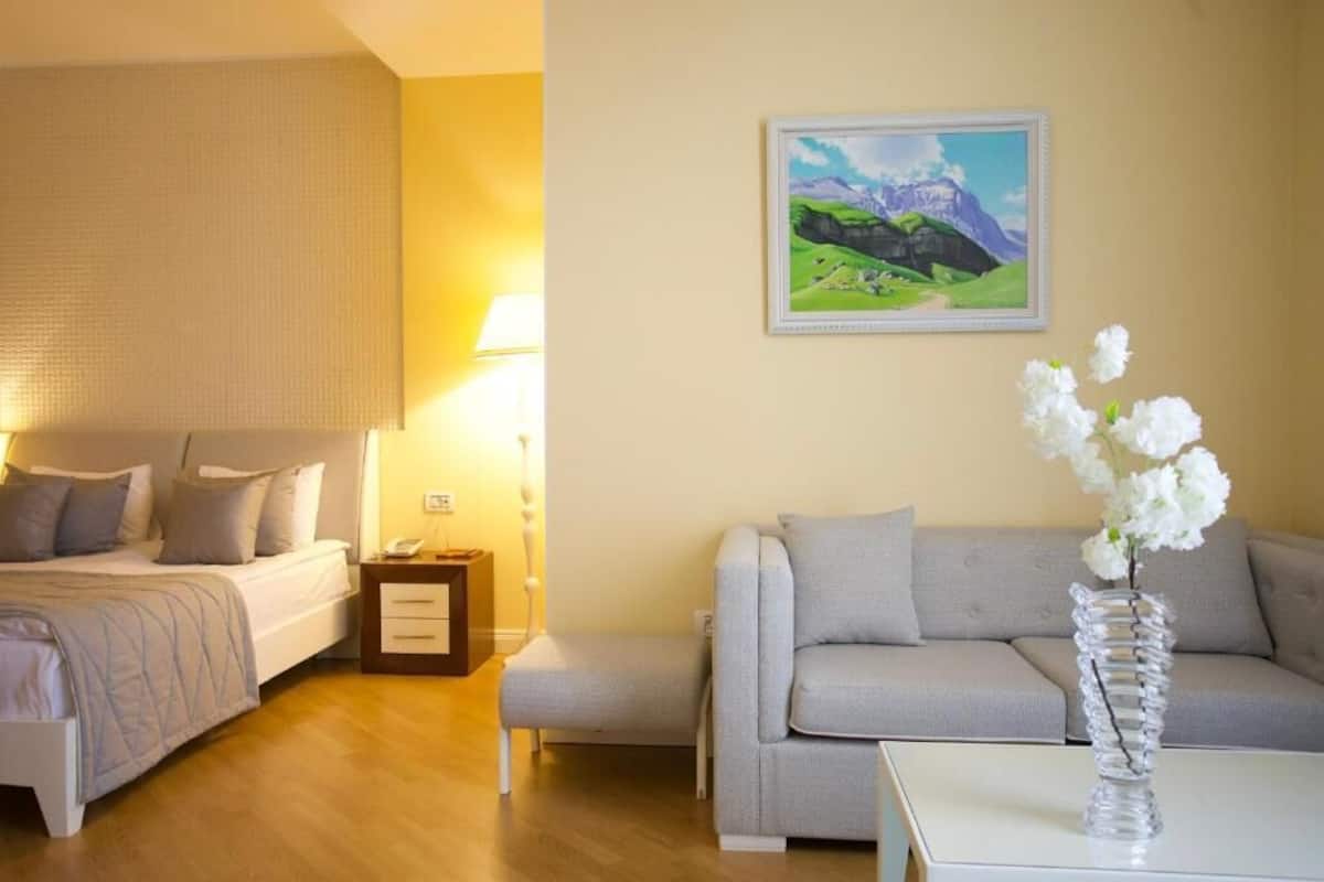 Executive Suite, City View | Minibar, in-room safe, desk, laptop workspace