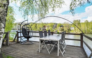 Outdoor dining - Riverside Villa with Private Jetty | Scenic Views (Torpshammar)
