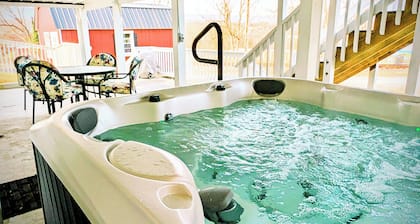 Hot Tub! Arcade! Walk to Everything! Historic home perched atop Main Street!