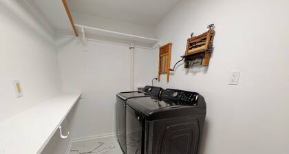 Hot Tub! Arcade! Walk to Everything! Historic home perched atop Main Street!