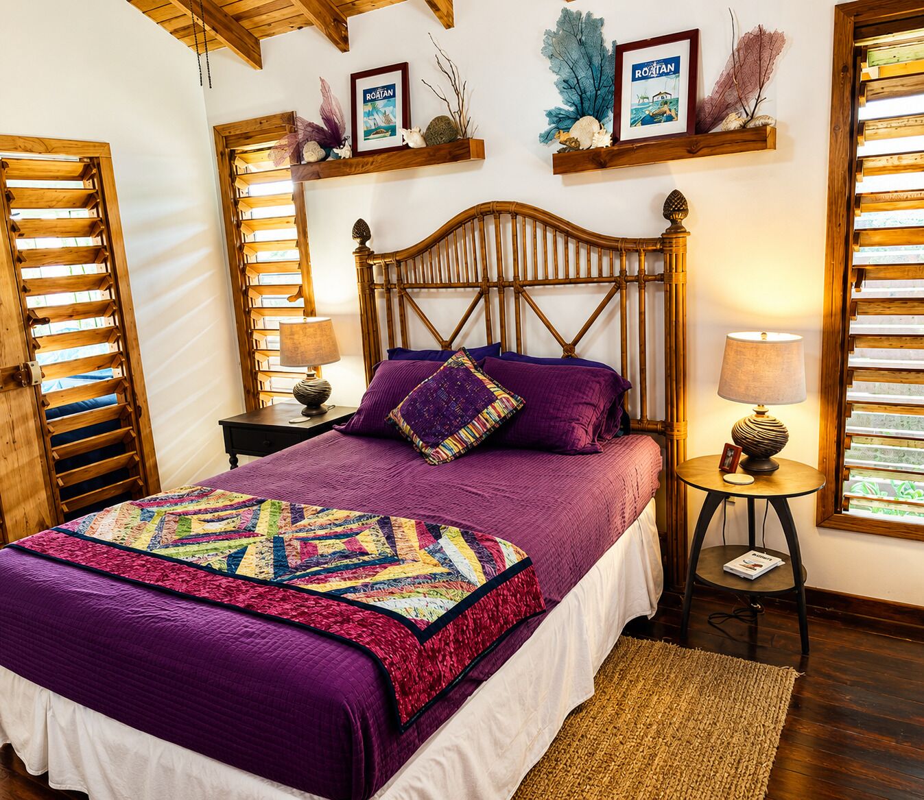 A bedroom with a wooden headboard, a bed with a purple quilt, and a nightstand with a lamp.