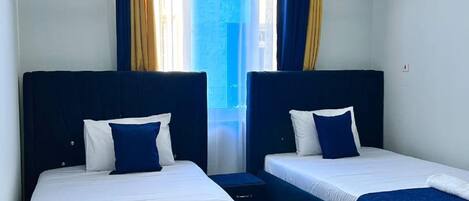 Standard Room | Blackout curtains, iron/ironing board, free WiFi