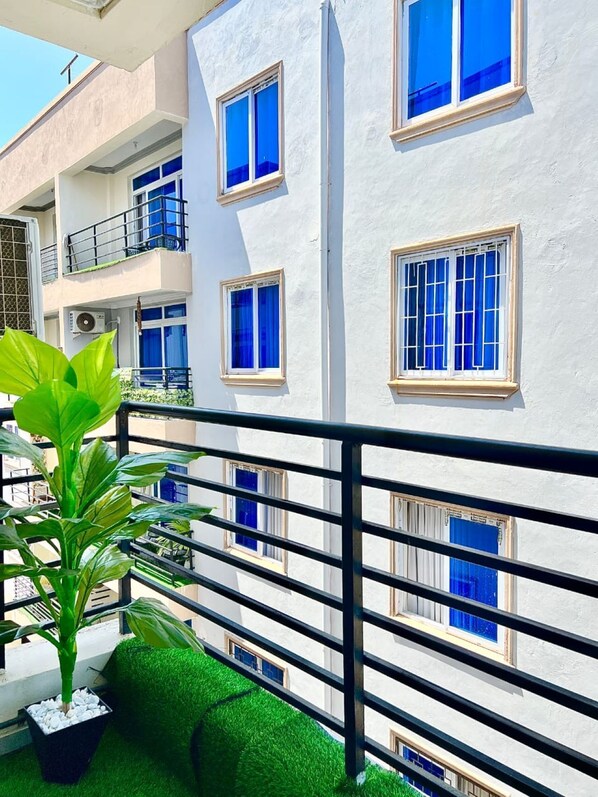 Apartment, Balcony, Pool View | Property grounds - Pavillion Suites (Mombasa)