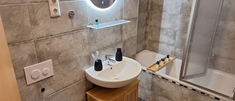 Hair dryer, towels, soap, toilet paper