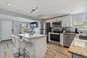 Fridge, microwave, oven, stovetop - Billy's Beach Bungalow (Redington Shores)