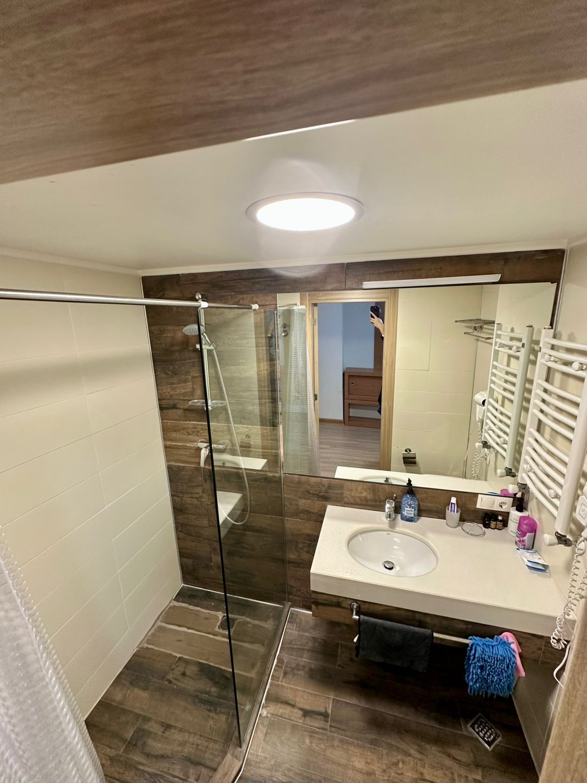 Shower, hair dryer, towels, toilet paper