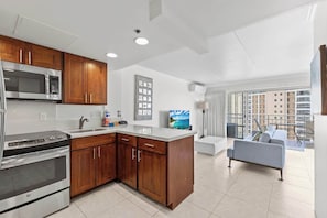 Apartment, 1 Bedroom, Beachfront | Private kitchen | Fridge, microwave, oven, stovetop - @ Marbella Lane Ocean Breeze Lagoon Front Stay (Honolulu)