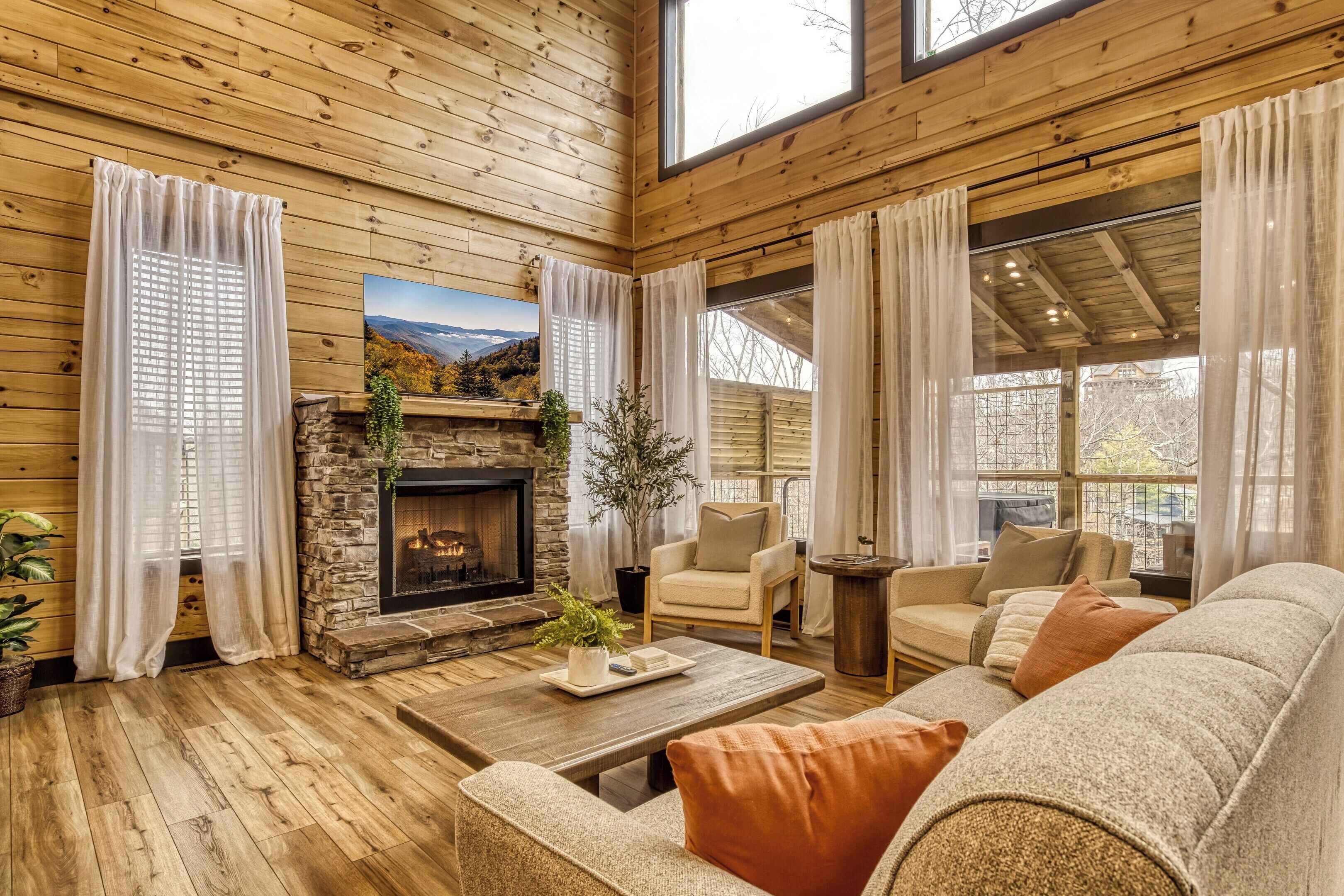 Gather in the bright, open living room where modern touches meet mountain comfort