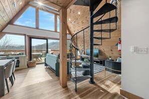 Living area - Stunning A-Frame w/ Hot Tub + Epic Mountain Views!! 10 mins to Pigeon Forge. (Sevierville)
