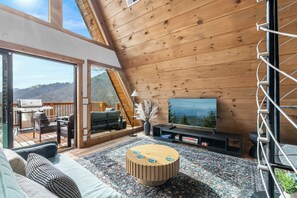Living area - Stunning A-Frame w/ Hot Tub + Epic Mountain Views!! 10 mins to Pigeon Forge. (Sevierville)