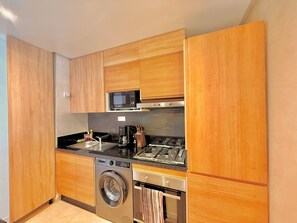 Private kitchen - The Blush Garden Apt with Pools and beach access in Taghazout Bay (Tamraght)