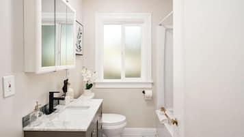 Hair dryer, towels, soap, toilet paper