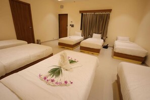 Family Room, Multiple Beds | Desk, laptop workspace, free WiFi - Ramaya Motel & Resorts (Ujjain)