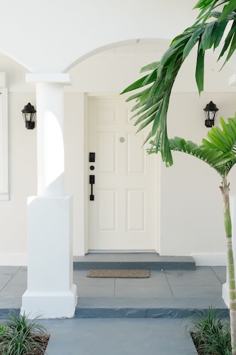 Spacious 4BR Modern Coastal Home by the Water | Perfect for Families & Groups!
