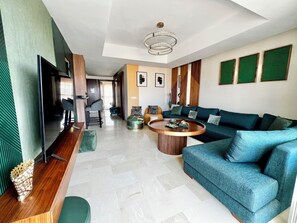 Living area - Architect Design Apt with sea views and pools access in Taghazout Bay (Tamraght)