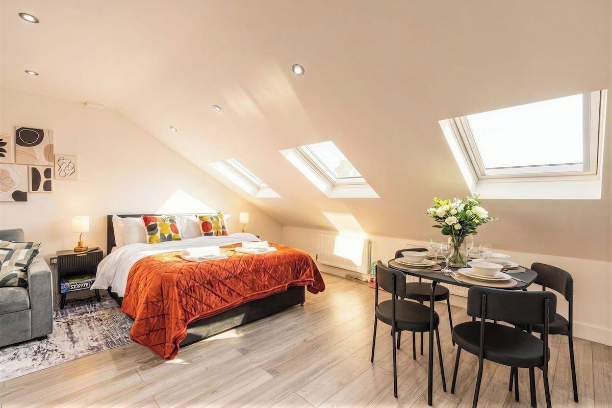 Luxury Studio | Premium bedding, desk, laptop workspace, blackout drapes