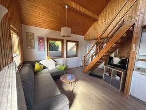 Living area - Modern vacation home with lake view |Feriensiedlung Kiefernhain (Krakow am See)