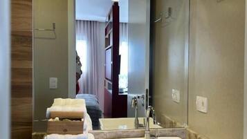 Shower, free toiletries, hair dryer, towels