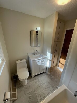Hair dryer, towels, soap, shampoo