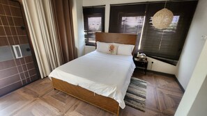 Appart'hôtel Familial, vue plage | Coffres-forts dans les chambres, rideaux occultants