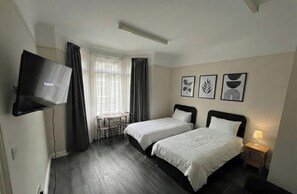 Superior Twin kamer, gemeenschappelijke badkamer