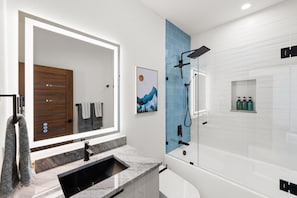 Shower, hair dryer, bidet, towels