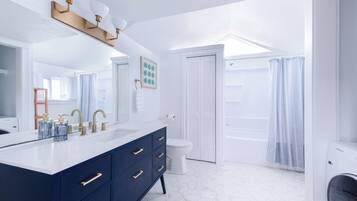 Hair dryer, towels, soap, shampoo