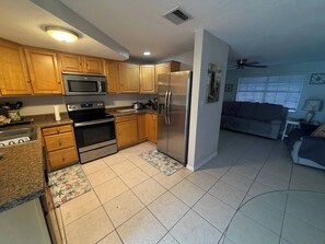 Microwave, oven, stovetop, dishwasher - Oasis 2BR Lakefront home W/inground pool (Port Richey)