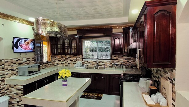 Private kitchen - Cozy & Secure 2BR Old Harbour Retreat: All the Comforts of Your Own Home (St.Catherine)