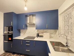 Een magnetron, een oven, een kookplaat