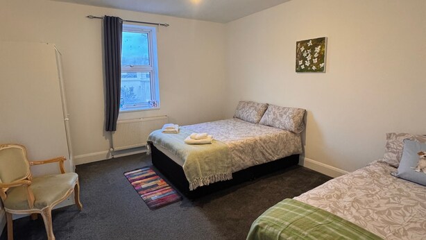 Unclassified image, 1 of 8, button - Room-nextdoor Stays Morden (Morden)