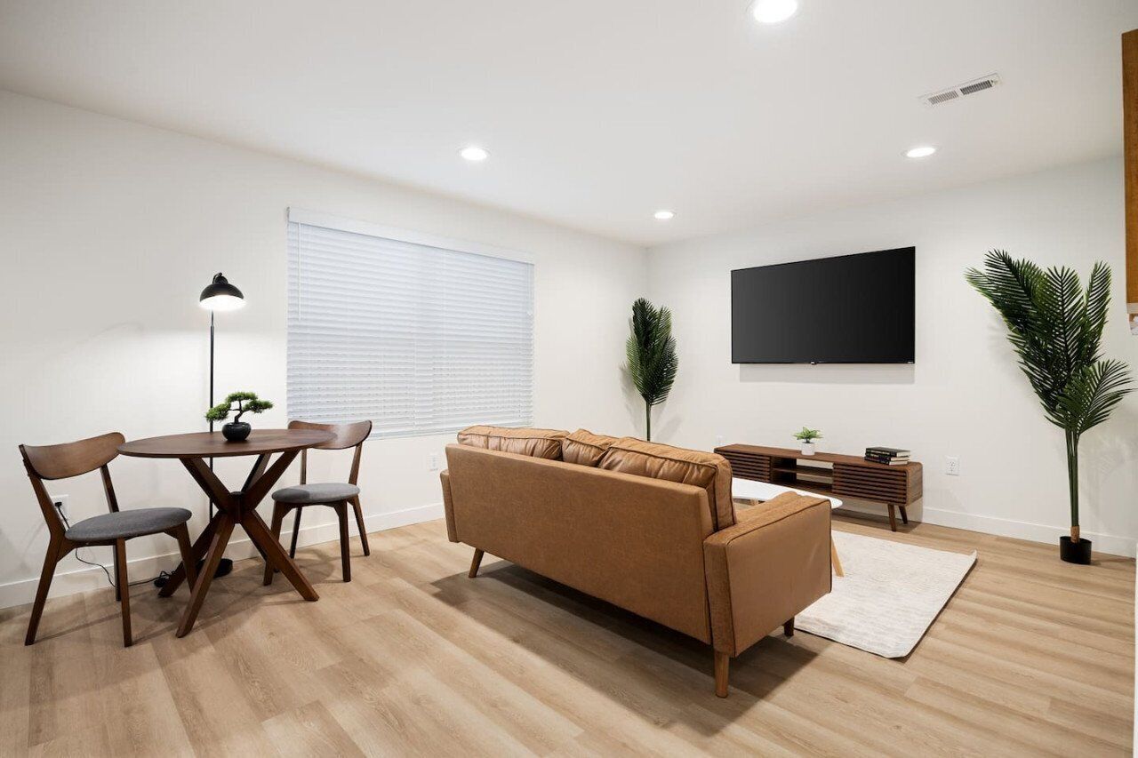 Apartment, Non Smoking | Living area | 42-inch flat-screen TV with cable channels