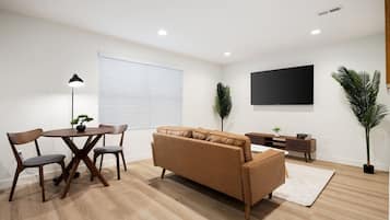 Apartment, Non Smoking | Living area | 42-inch flat-screen TV with cable channels