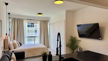 Coffres-forts dans les chambres, fer et planche à repasser