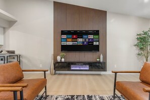 TV, fireplace - North Vegas Game Den – Arcade, Home Theater & Fun! (North Las Vegas)