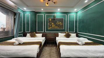 Panoramic Quadruple Room, Multiple Beds, Mountain View | Premium bedding, down comforters, memory foam beds, minibar