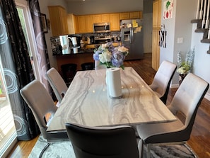 Dining - Spacious 4-bedroom house in SW Omaha. Hot Tub on patio. Massage Chair in LvRm. (Omaha)