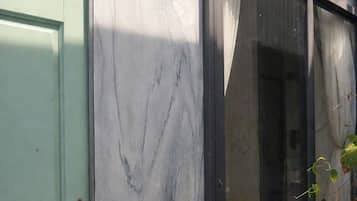 Habitación familiar doble, vistas al jardín | Terraza o patio