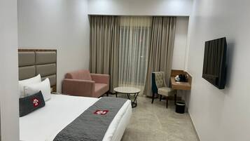 Deluxe Room | In-room safe, desk, laptop workspace, iron/ironing board